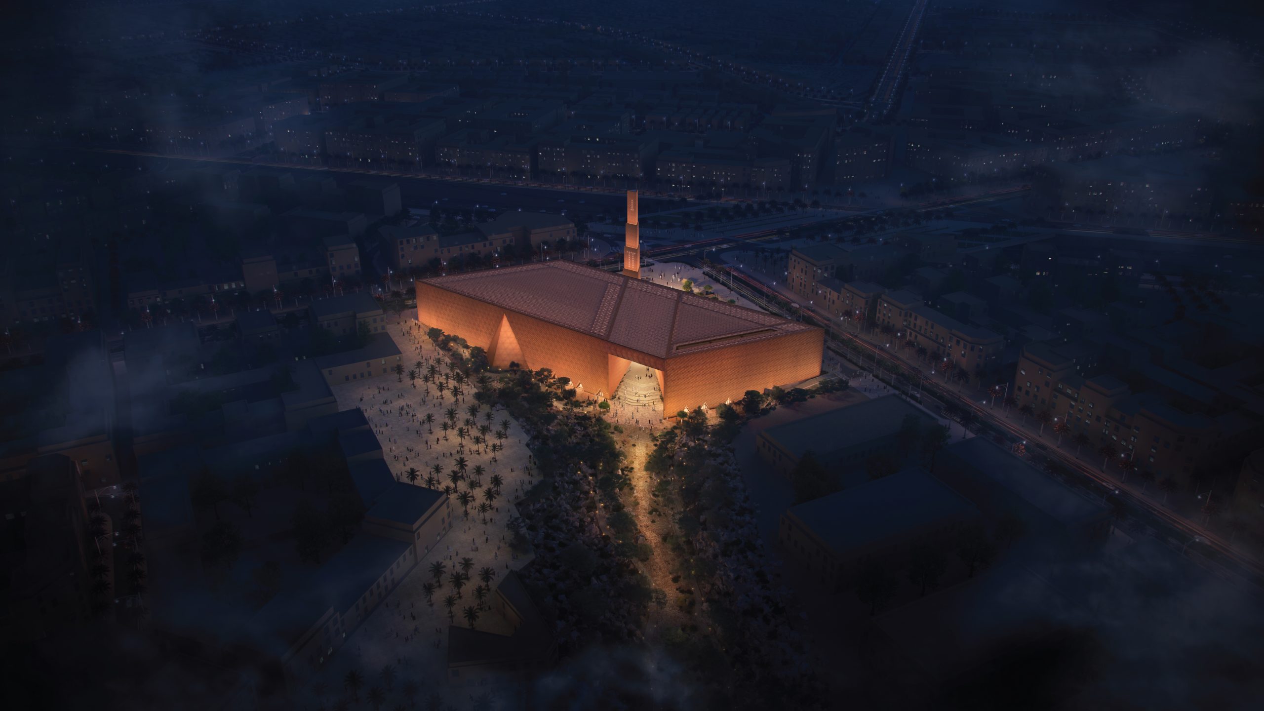Aerial night render of the Grand Mosque in Diriyah, with its lit lattice walls, minaret and courtyards