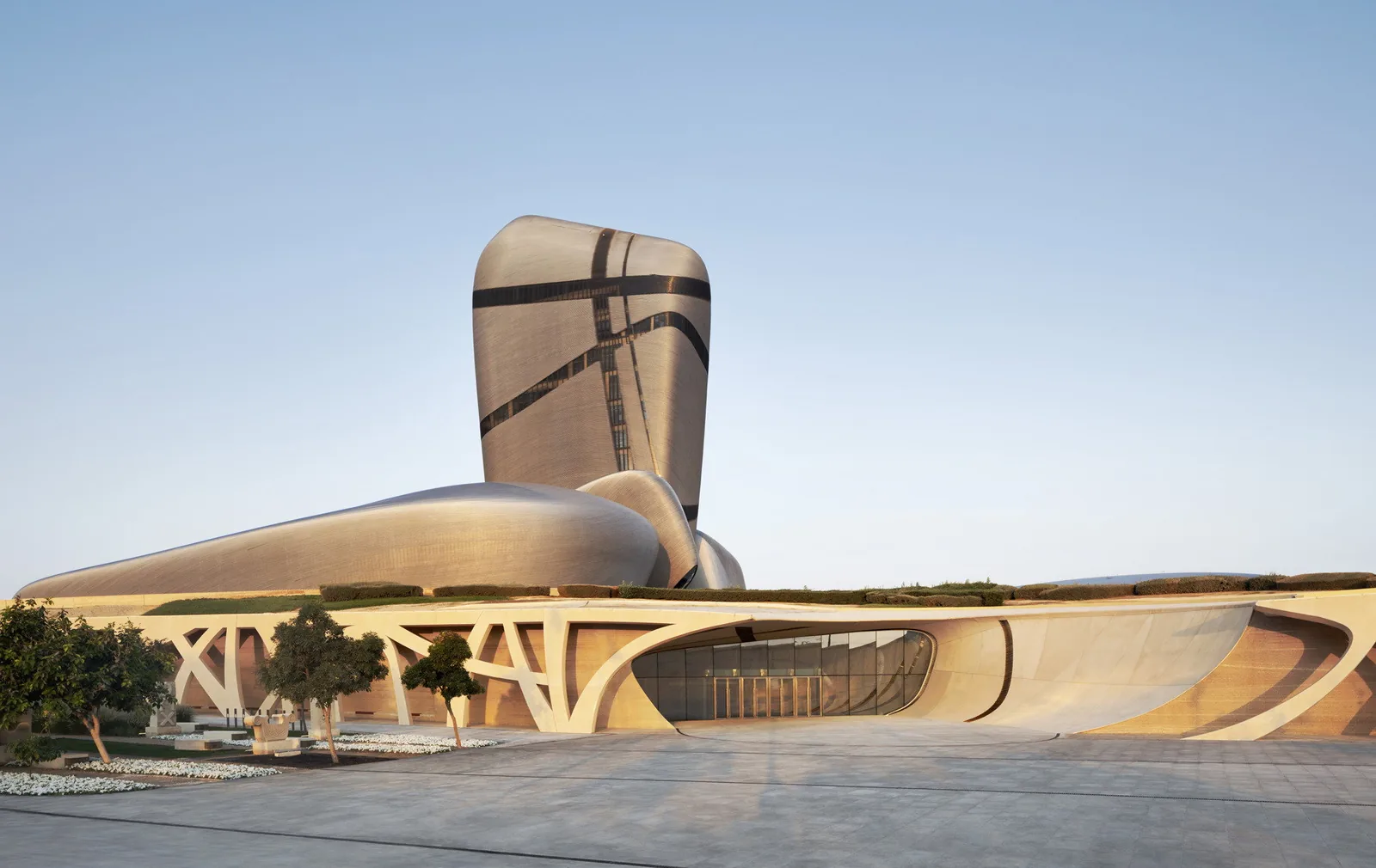 The tower, pebbles and the rammed earth plaza